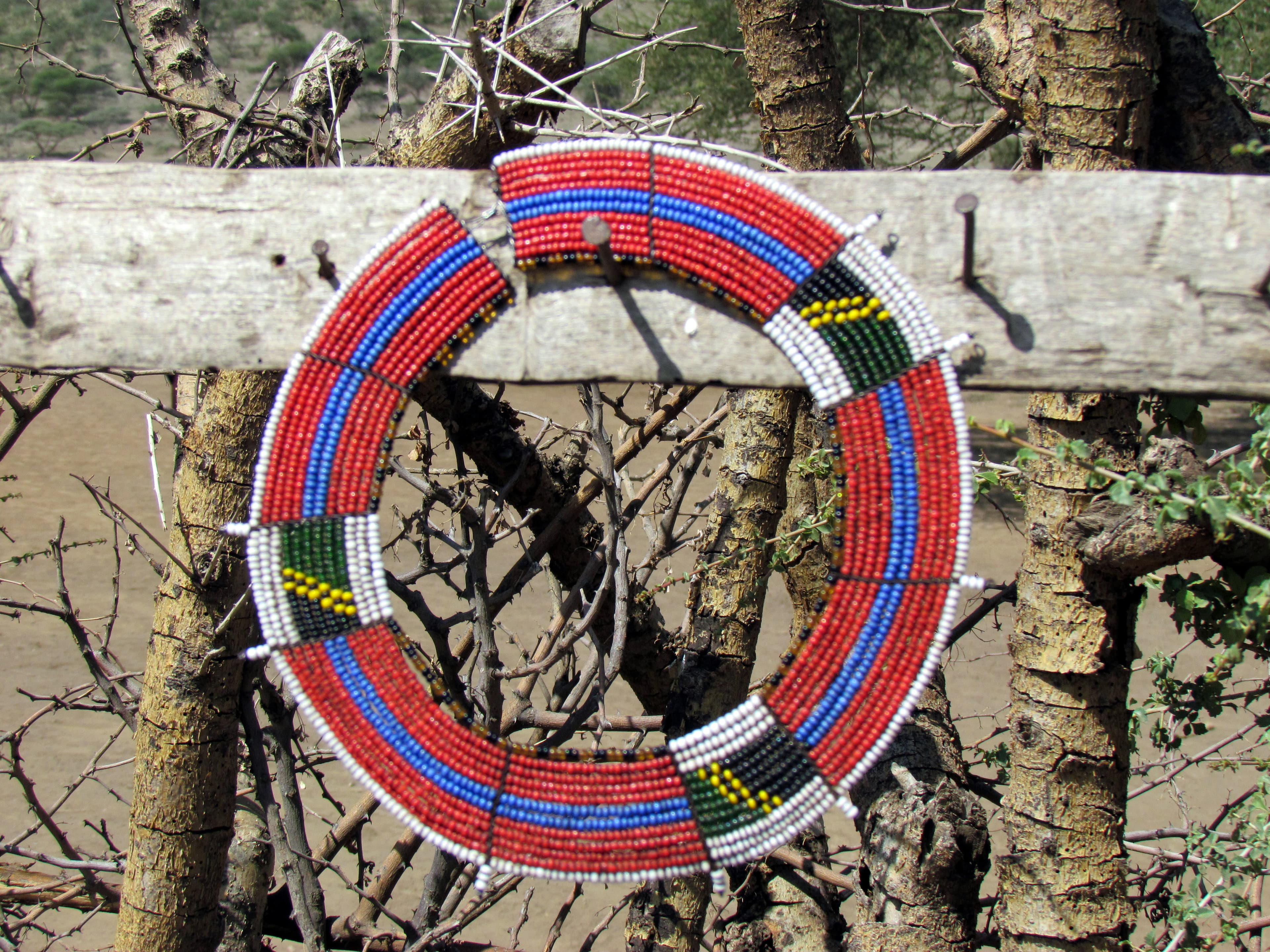 A Maasai beaded collar photographed in Ngorongoro; a craft reference, not the exact item for sale